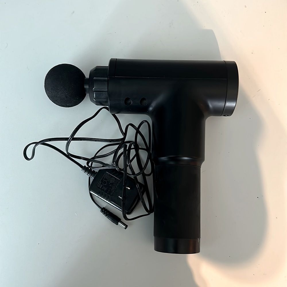 Massage gun with charger